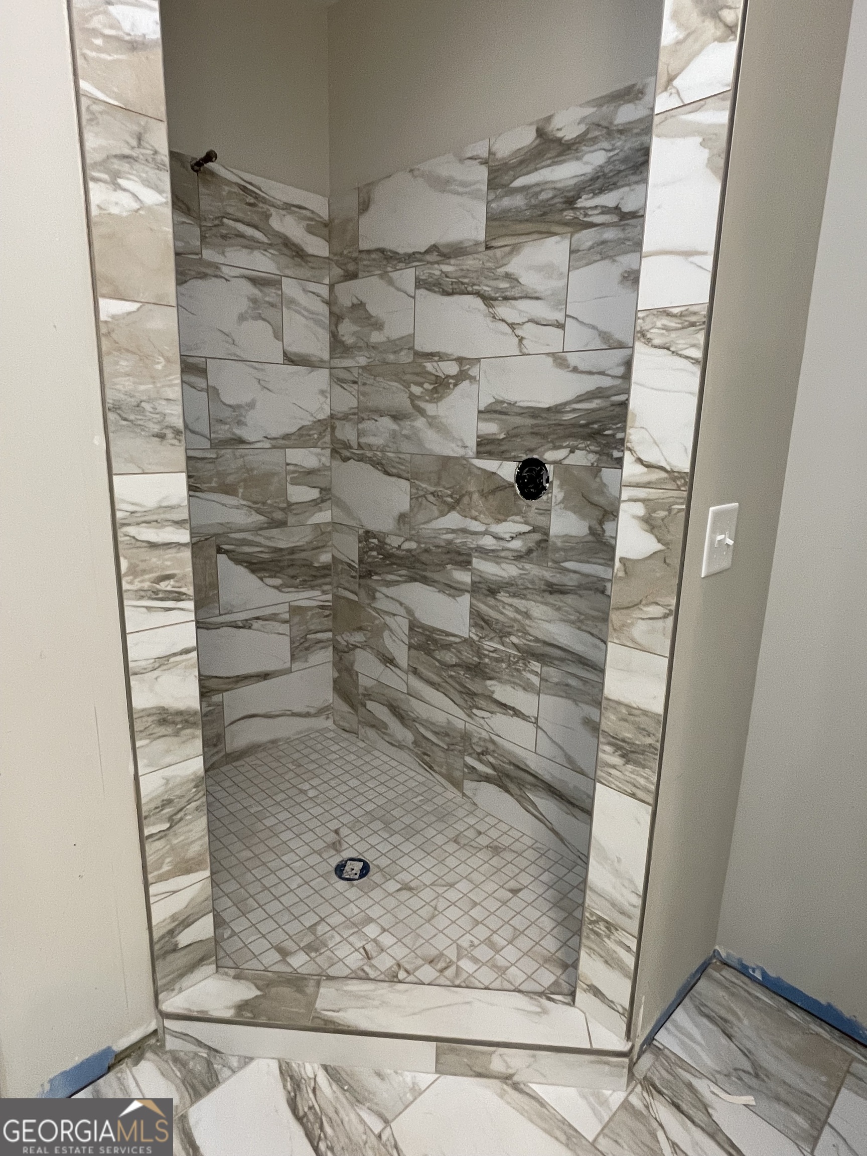 115 Drues Road Bowdon, GA 30108 - Photo 10 of 13 a bathroom with a glass door shower