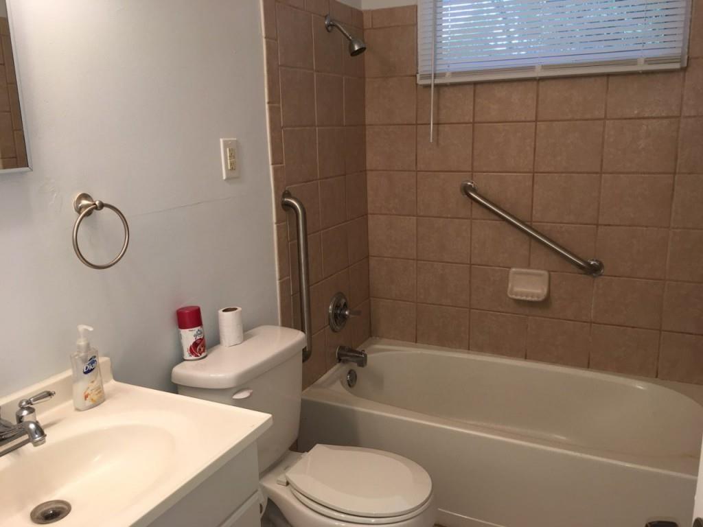 2335 Scotty Circle Decatur, GA 30032 - Photo 5 of 9 a bathroom with a sink toilet and shower