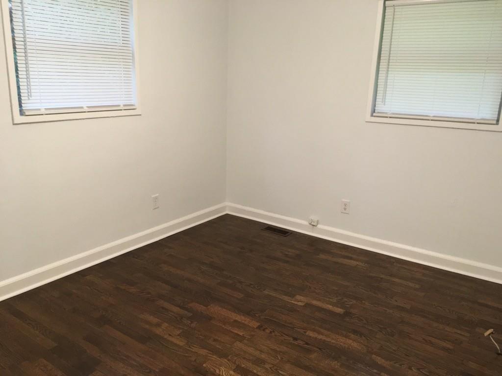 2335 Scotty Circle Decatur, GA 30032 - Photo 7 of 9 a view of a small space with wooden floor and a window