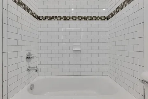 a bathroom with a bathtub