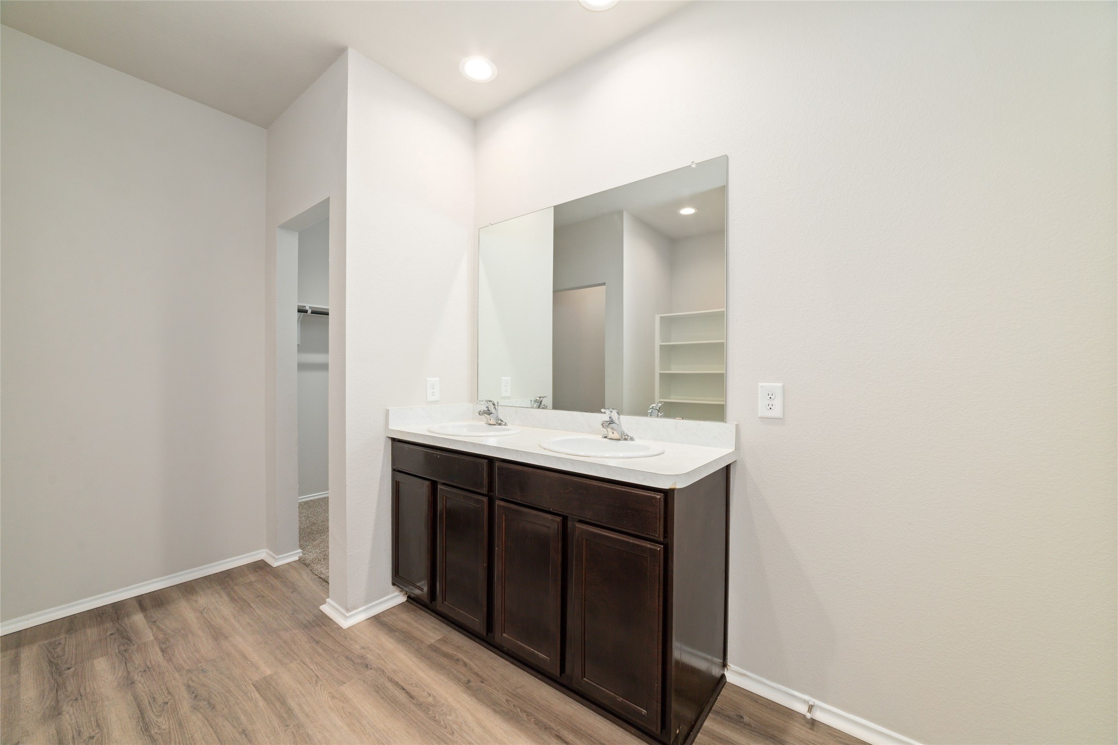 23702 Harrow Field Ln Spring Spring, TX 77373 - Photo 19 of 32 a bathroom with a sink and a mirror
