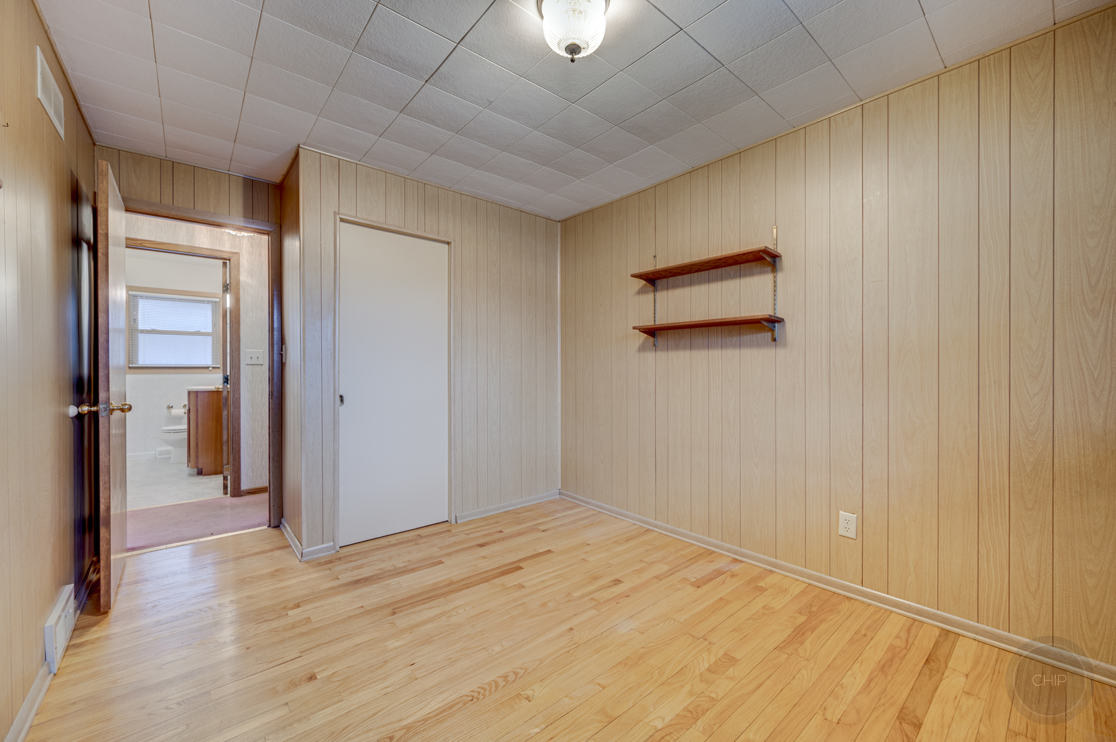 S528 Forest Street Winfield, IL 60190 - Photo 14 of 35 a view of empty room with wooden floor