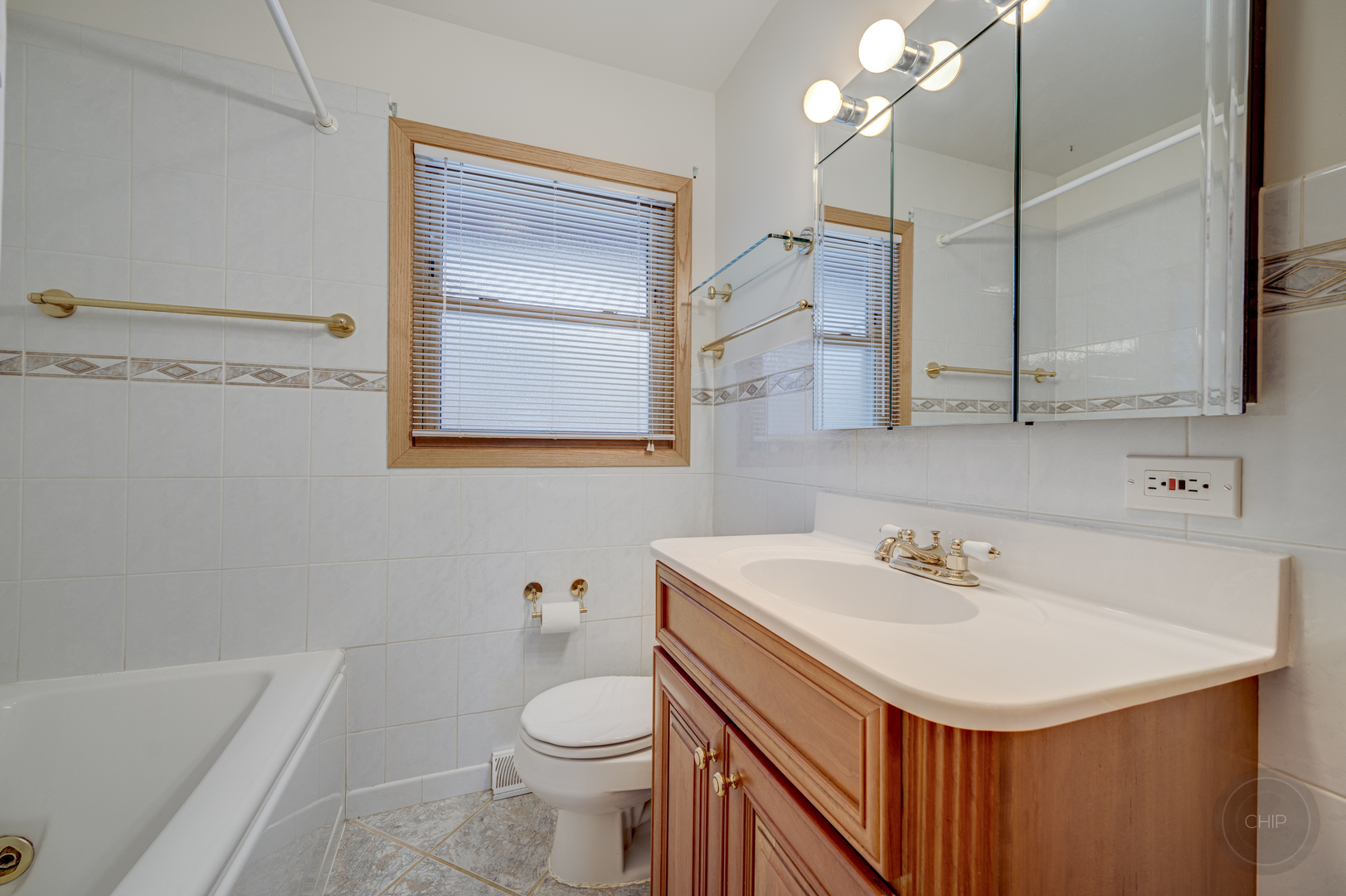 S528 Forest Street Winfield, IL 60190 - Photo 15 of 35 a bathroom with a sink a toilet and mirror