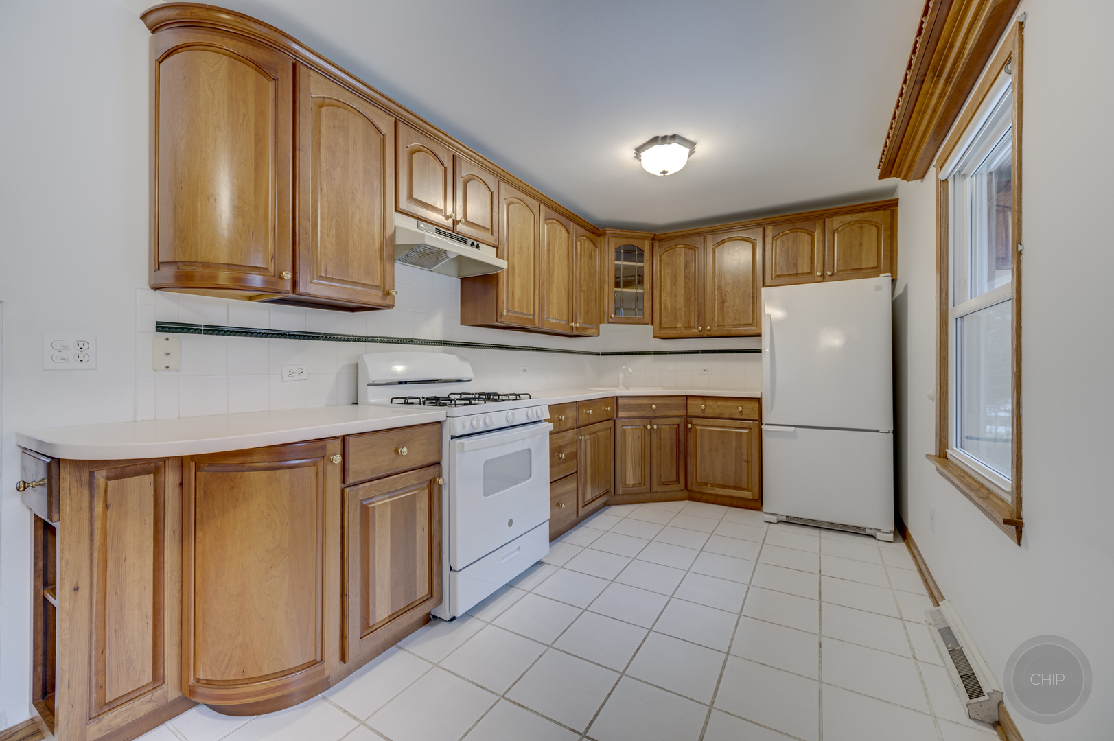 S528 Forest Street Winfield, IL 60190 - Photo 4 of 35 a kitchen with stainless steel appliances granite countertop a refrigerator sink and cabinets