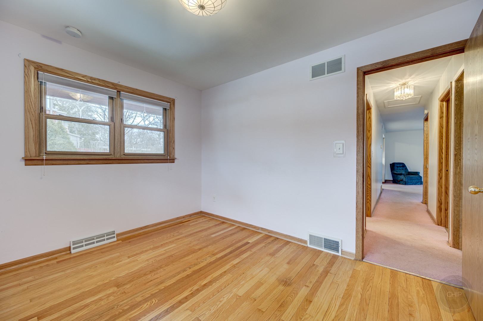 S528 Forest Street Winfield, IL 60190 - Photo 9 of 35 a view of a room with wooden floor and a bathroom