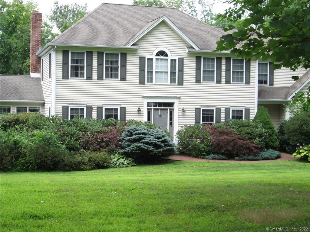 317 Norfolk Road Litchfield, CT 06759 - Photo 1 of 1 a front view of a house with a garden