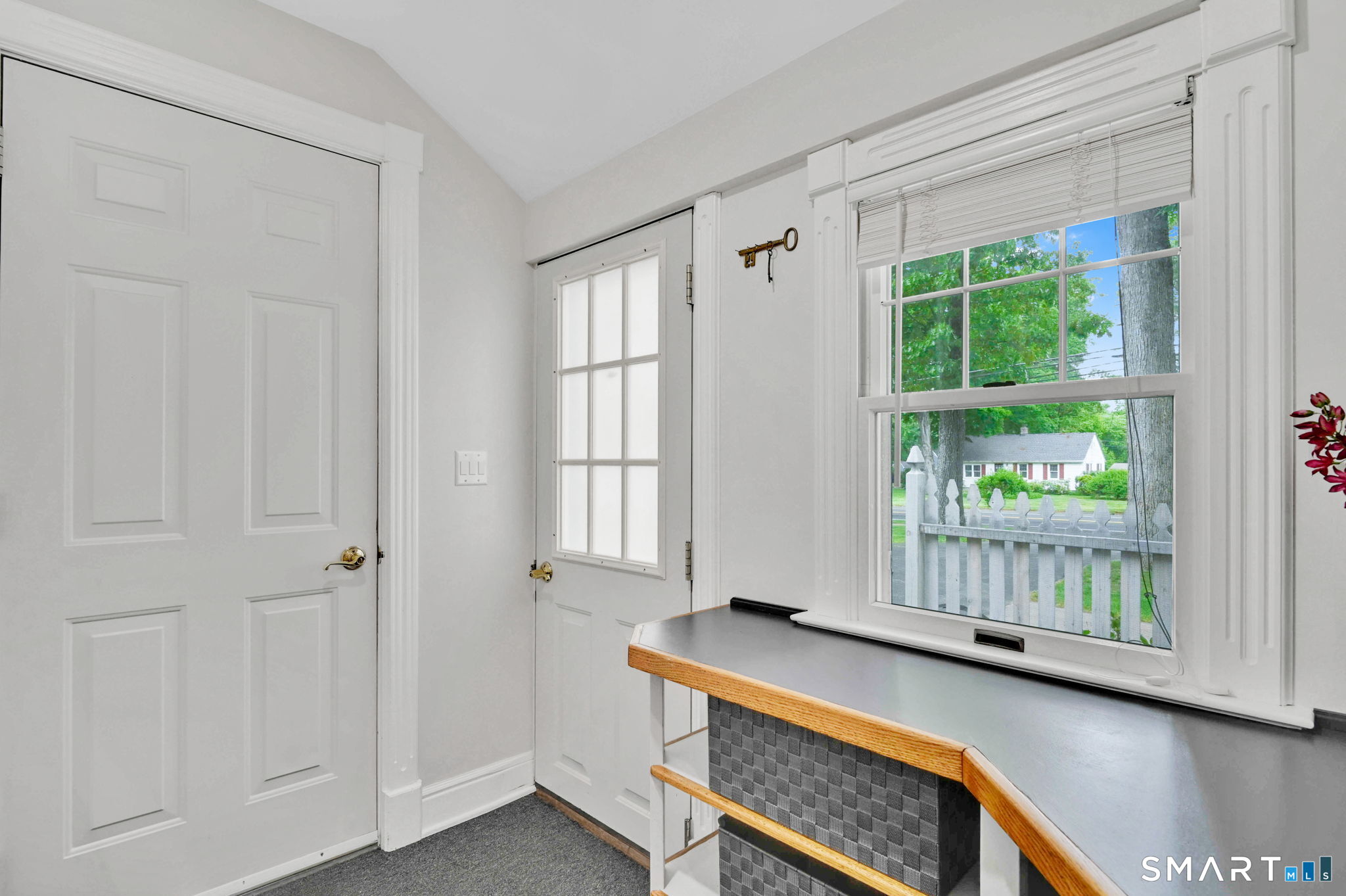 35 S Road Enfield, CT 06082 - Photo 13 of 40 Mudroom with built-ins, access to garage and side door to driveway.
