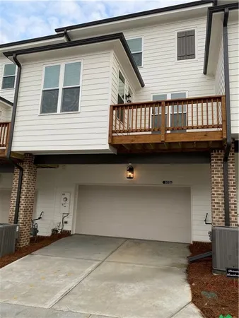 a front view of a house with balcony