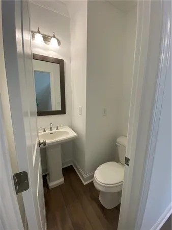 a bathroom with a sink and a toilet