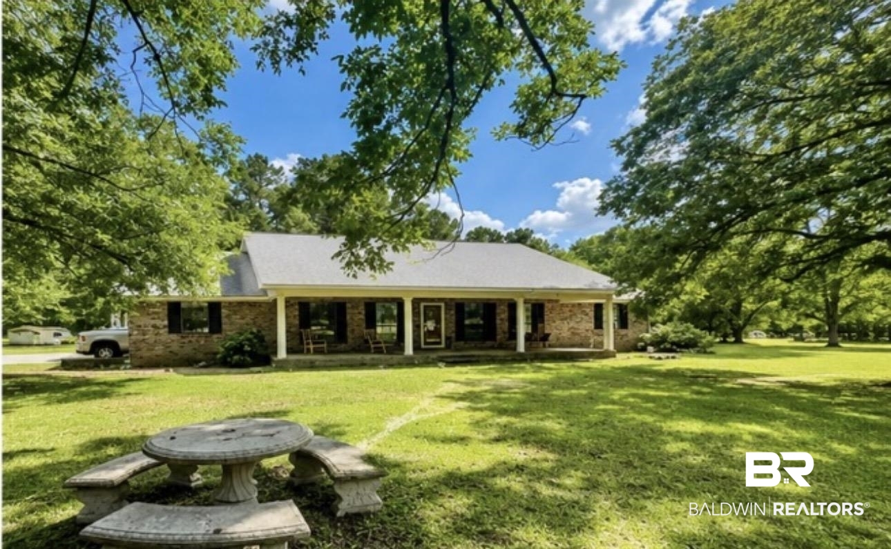 12092 Gantt Red Level Road Andalusia, AL 36421 - Photo 5 of 33 Brick exterior residence with a covered front porch supported by white columns