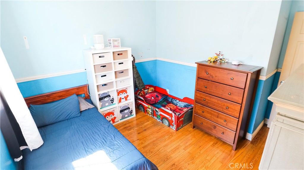 9362 Gullo Avenue Arleta, CA 91331 - Photo 20 of 29 walk in closet with clothes and shoes