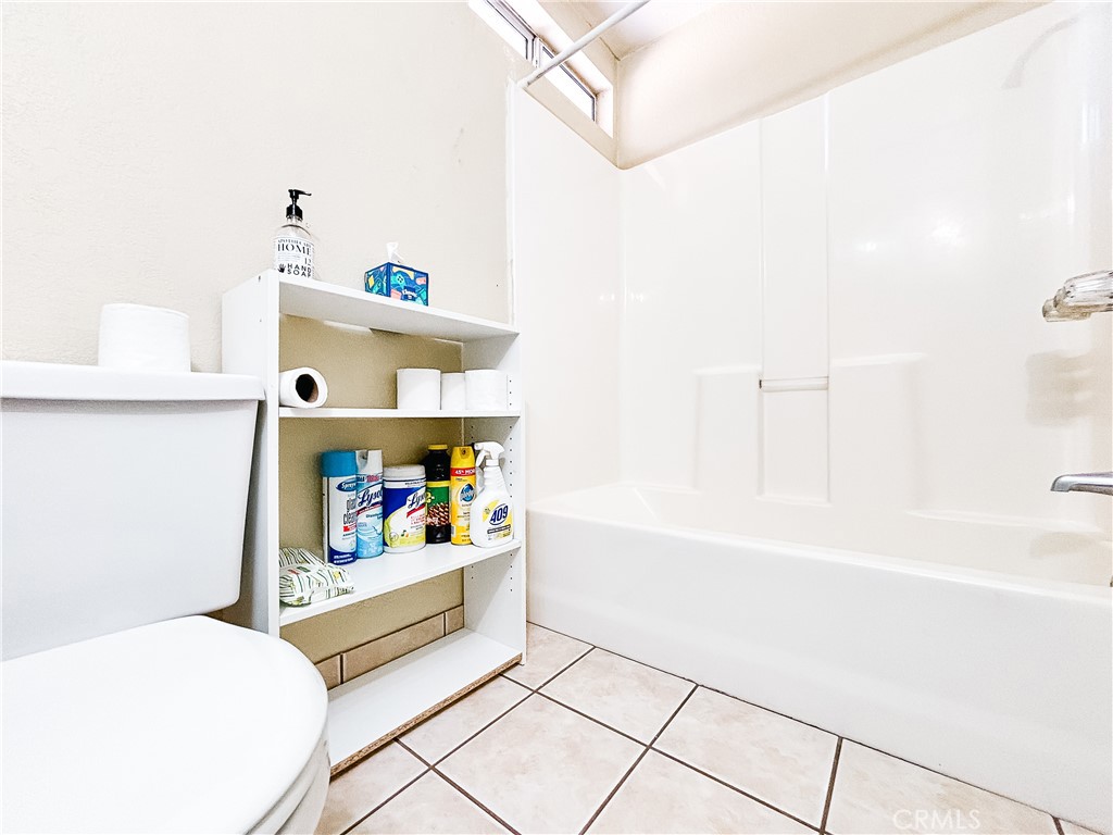 9362 Gullo Avenue Arleta, CA 91331 - Photo 29 of 29 a bathroom with a sink a bath tub and shower