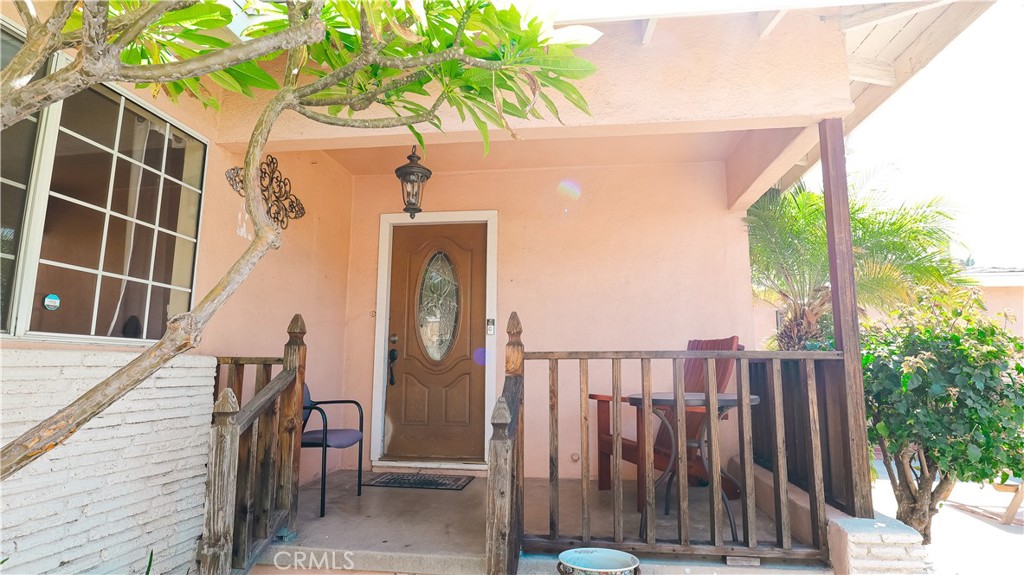 9362 Gullo Avenue Arleta, CA 91331 - Photo 5 of 29 a view of balcony with wooden floor and fence
