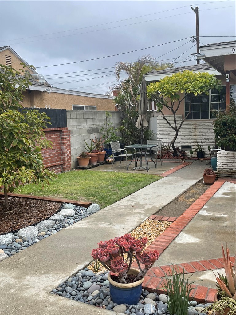 9362 Gullo Avenue Arleta, CA 91331 - Photo 7 of 29 a view of a backyard with plants and a patio