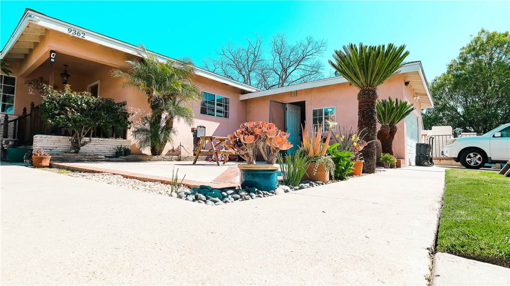 9362 Gullo Avenue Arleta, CA 91331 - Photo 8 of 29 a front view of a house with a yard