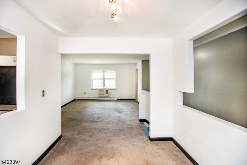 1130 Valley Road, Unit 2B Wayne, NJ 07470 - Photo 1 of 47 an empty room with windows