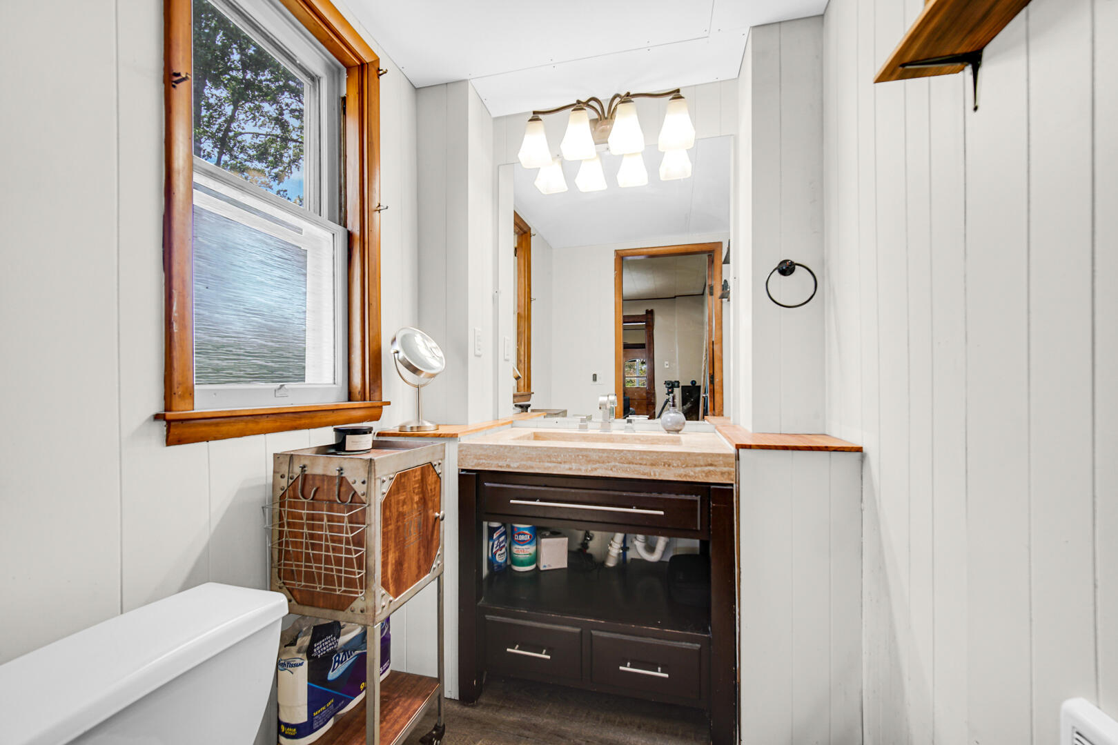 448 North Weston Street Rensselaer, IN 47978 - Photo 12 of 28 a bathroom with a sink a mirror and a toilet