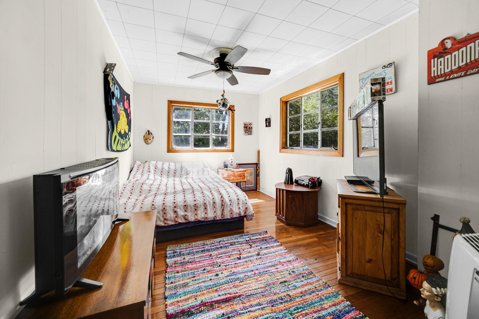 448 North Weston Street Rensselaer, IN 47978 - Photo 14 of 28 a bedroom with a bed and a flat tv screen on dresser