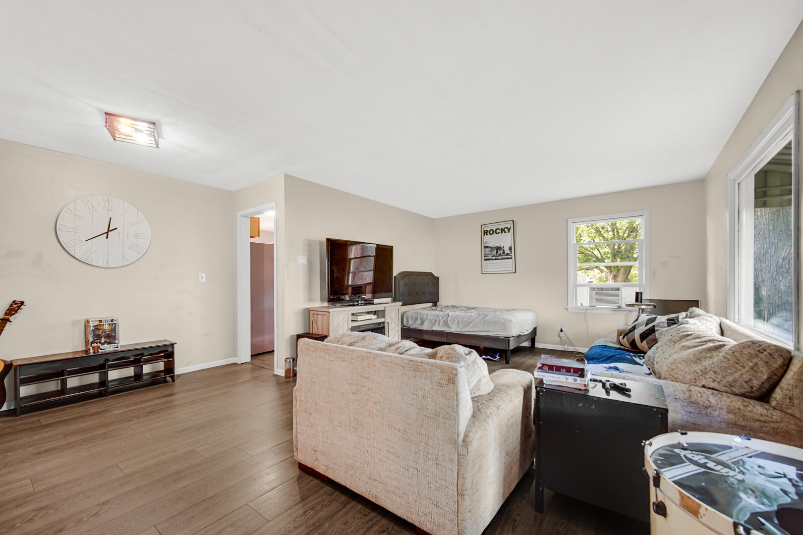 448 North Weston Street Rensselaer, IN 47978 - Photo 19 of 28 a living room with furniture and a flat screen tv
