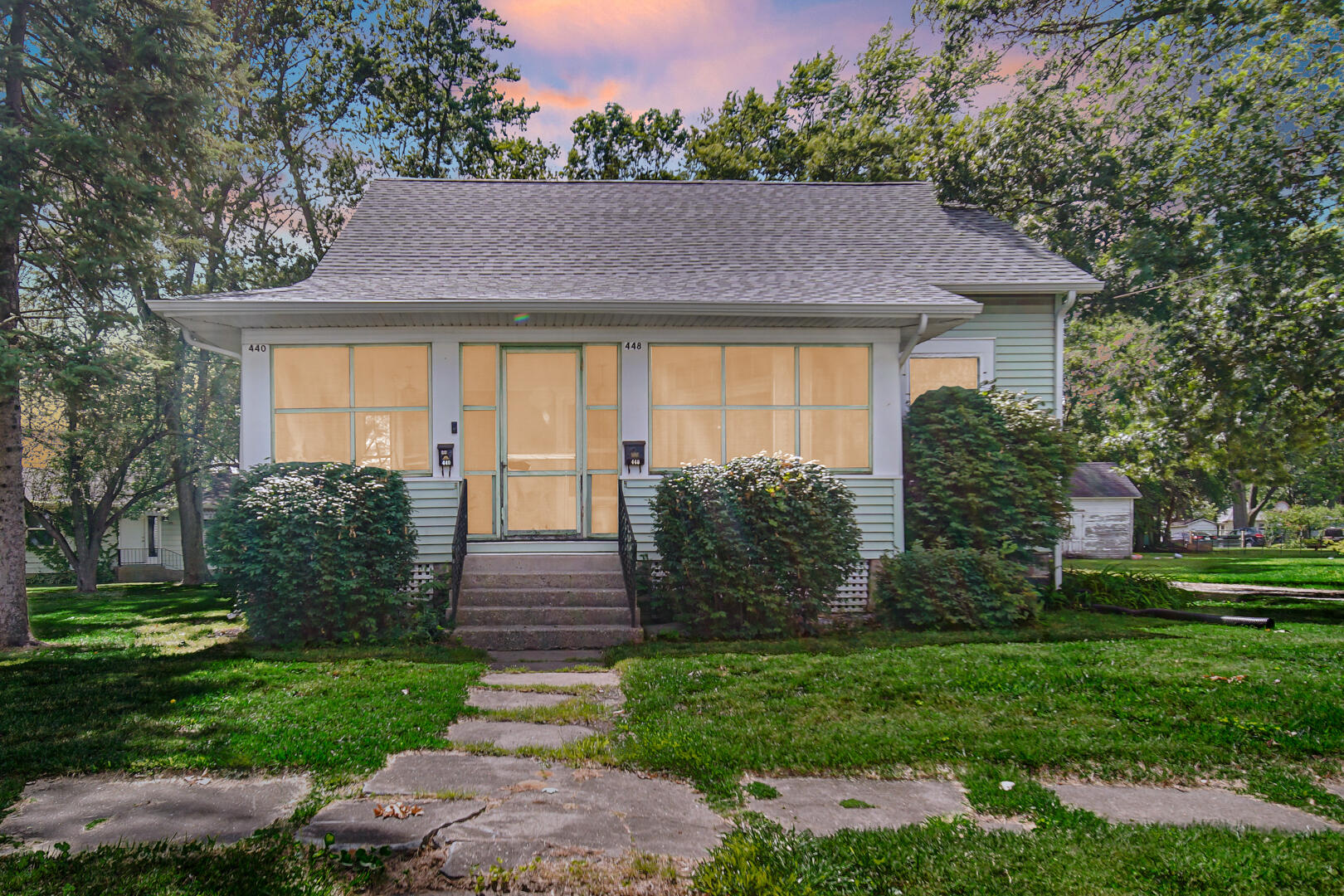 448 North Weston Street Rensselaer, IN 47978 - Photo 2 of 28 a front view of a house with a yard