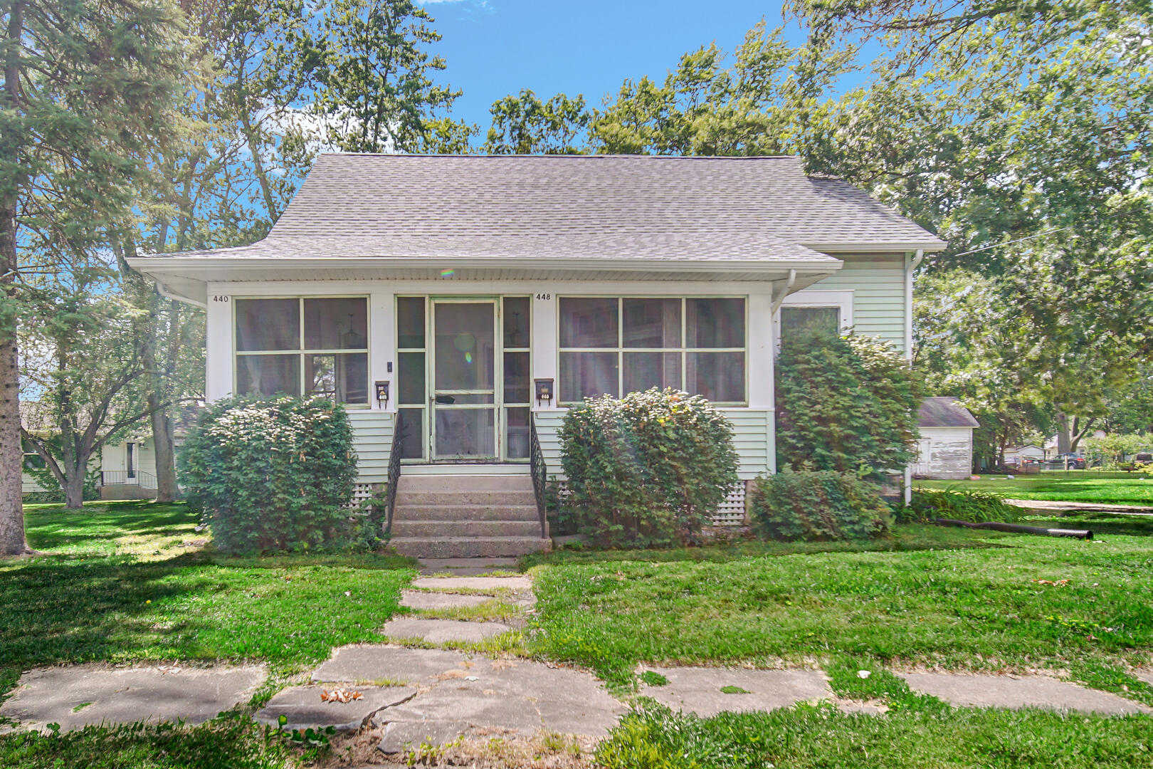 448 North Weston Street Rensselaer, IN 47978 - Photo 3 of 28 a front view of a house with garden