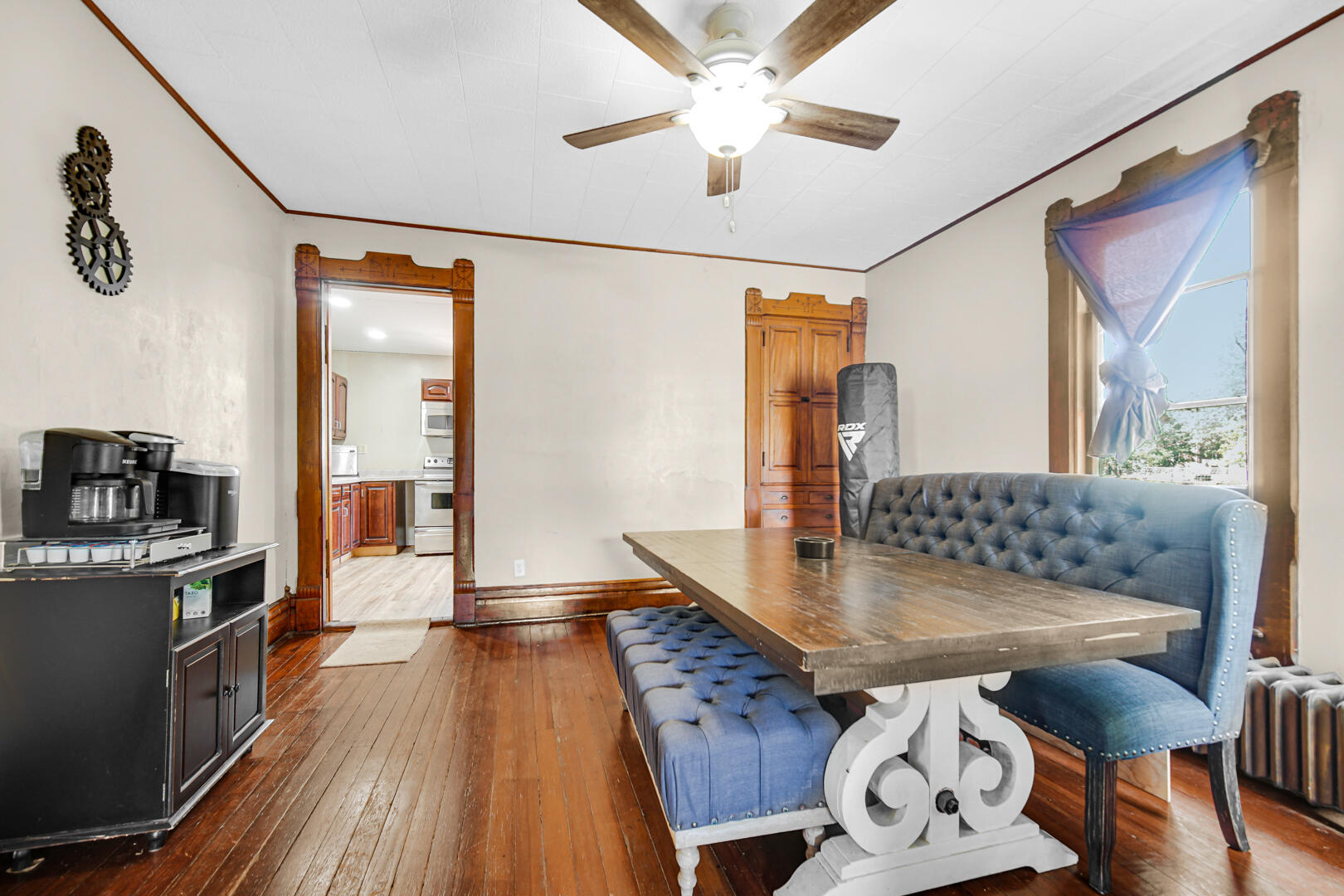 448 North Weston Street Rensselaer, IN 47978 - Photo 8 of 28 a living room with dining table and wooden floor