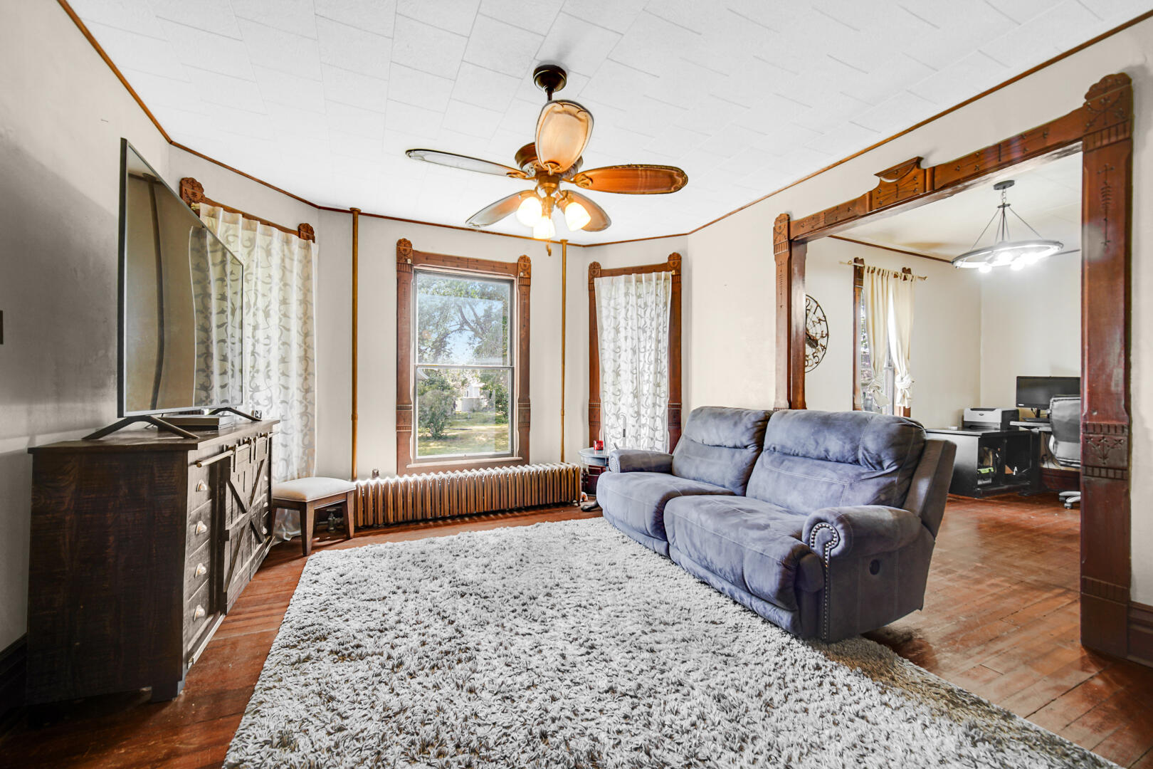 448 North Weston Street Rensselaer, IN 47978 - Photo 9 of 28 a living room with furniture and a large window