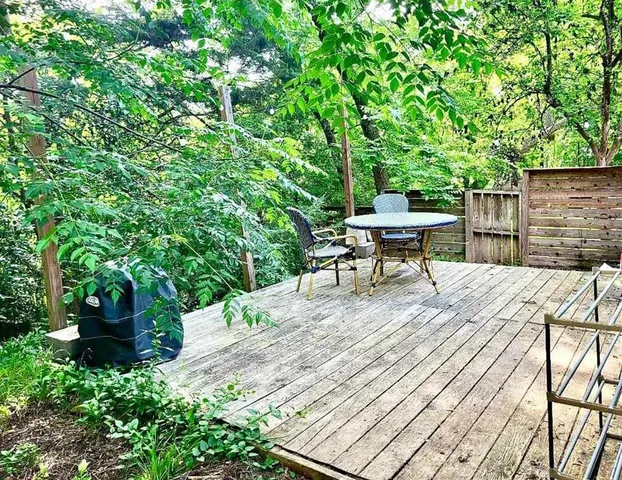 a garden view with a seating space