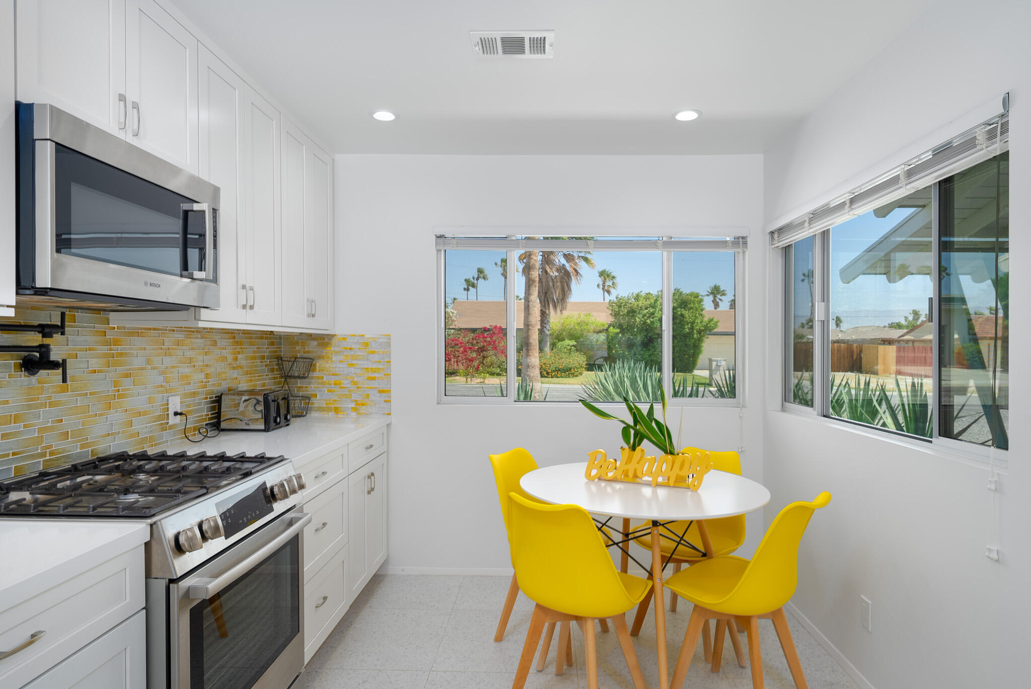 2383 East Powell Road Palm Springs, CA 92262 - Photo 13 of 32 a view of a dining room with furniture window and outside view