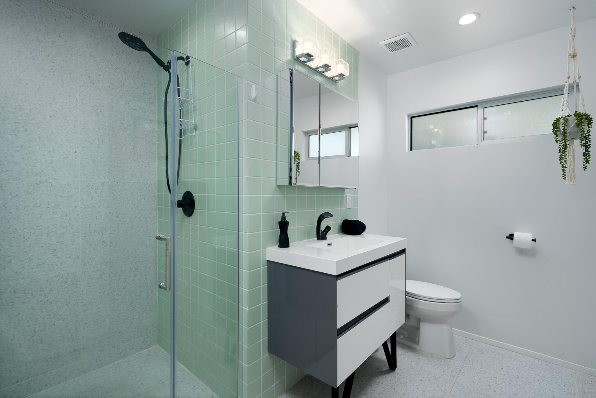 2383 East Powell Road Palm Springs, CA 92262 - Photo 19 of 32 a bathroom with a sink a toilet and shower