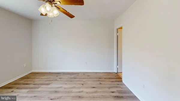 a kitchen with granite countertop a sink and a stove top oven