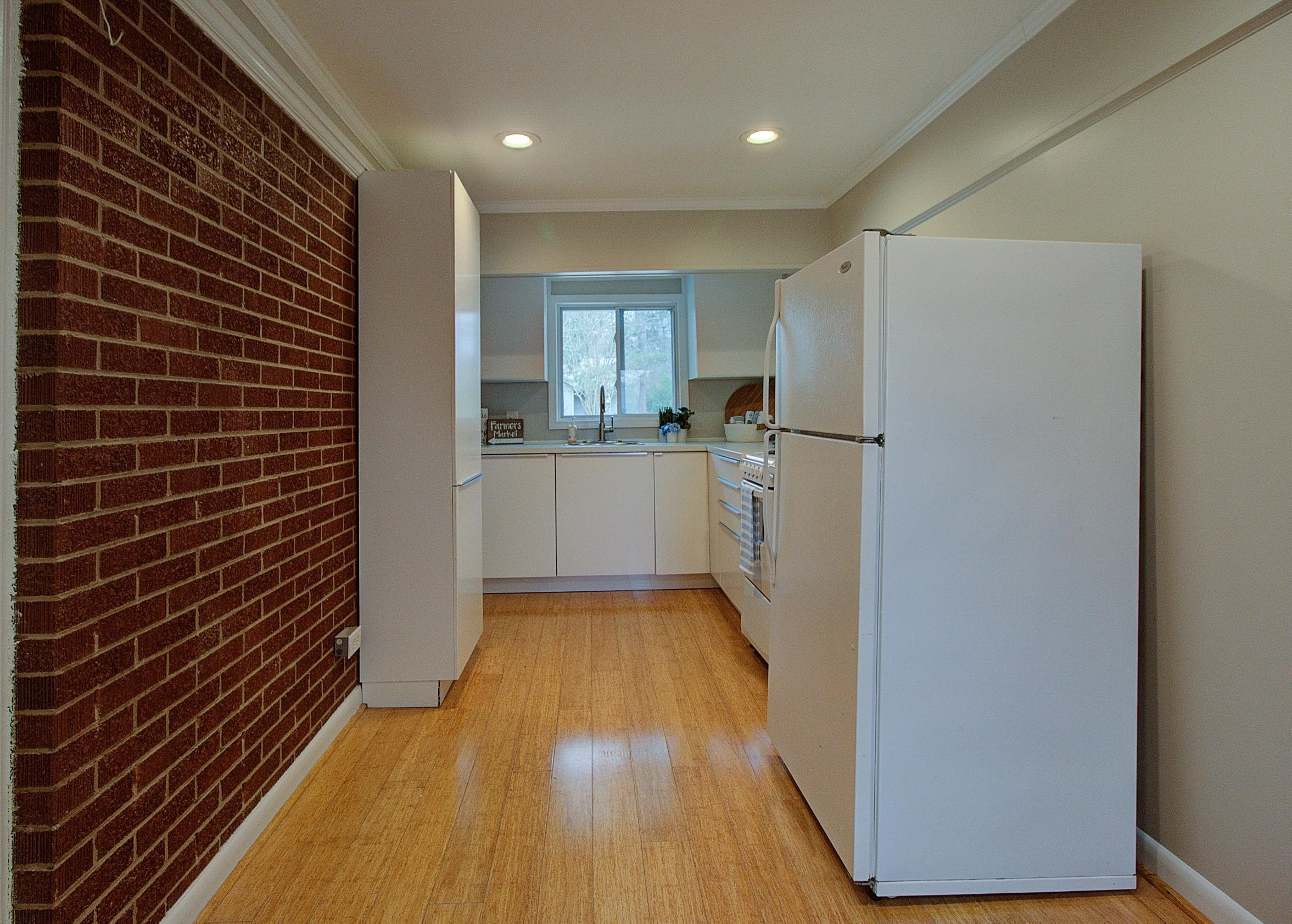 4115 St James Church Road Raleigh, NC 27604 - Photo 17 of 22 Full Kitchen with Dishwasher in MIL Suite MIL Suite Kitchen