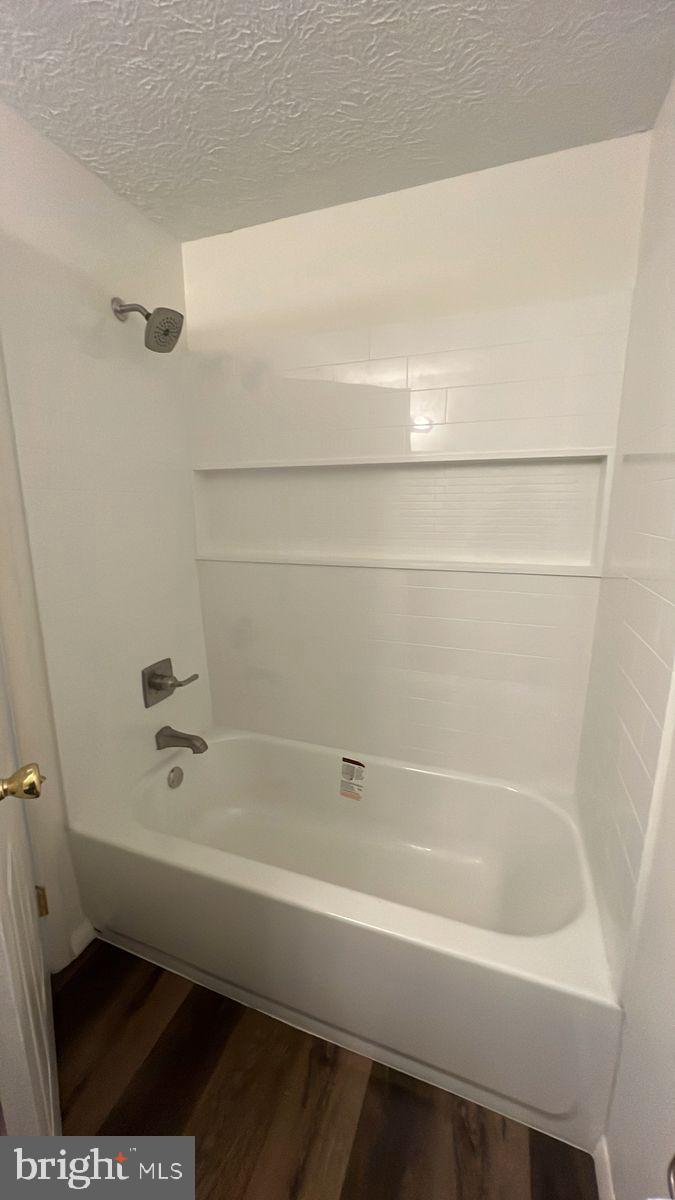 730 B Heather Ridge Drive, Unit 14B Frederick, MD 21702 - Photo 6 of 13 a bathroom with a bathtub