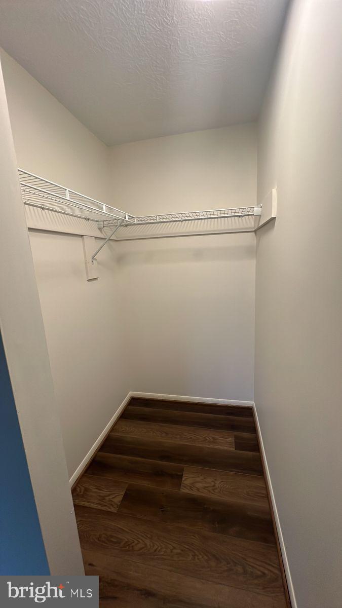 730 B Heather Ridge Drive, Unit 14B Frederick, MD 21702 - Photo 10 of 13 a view of utility room with racks on the wall