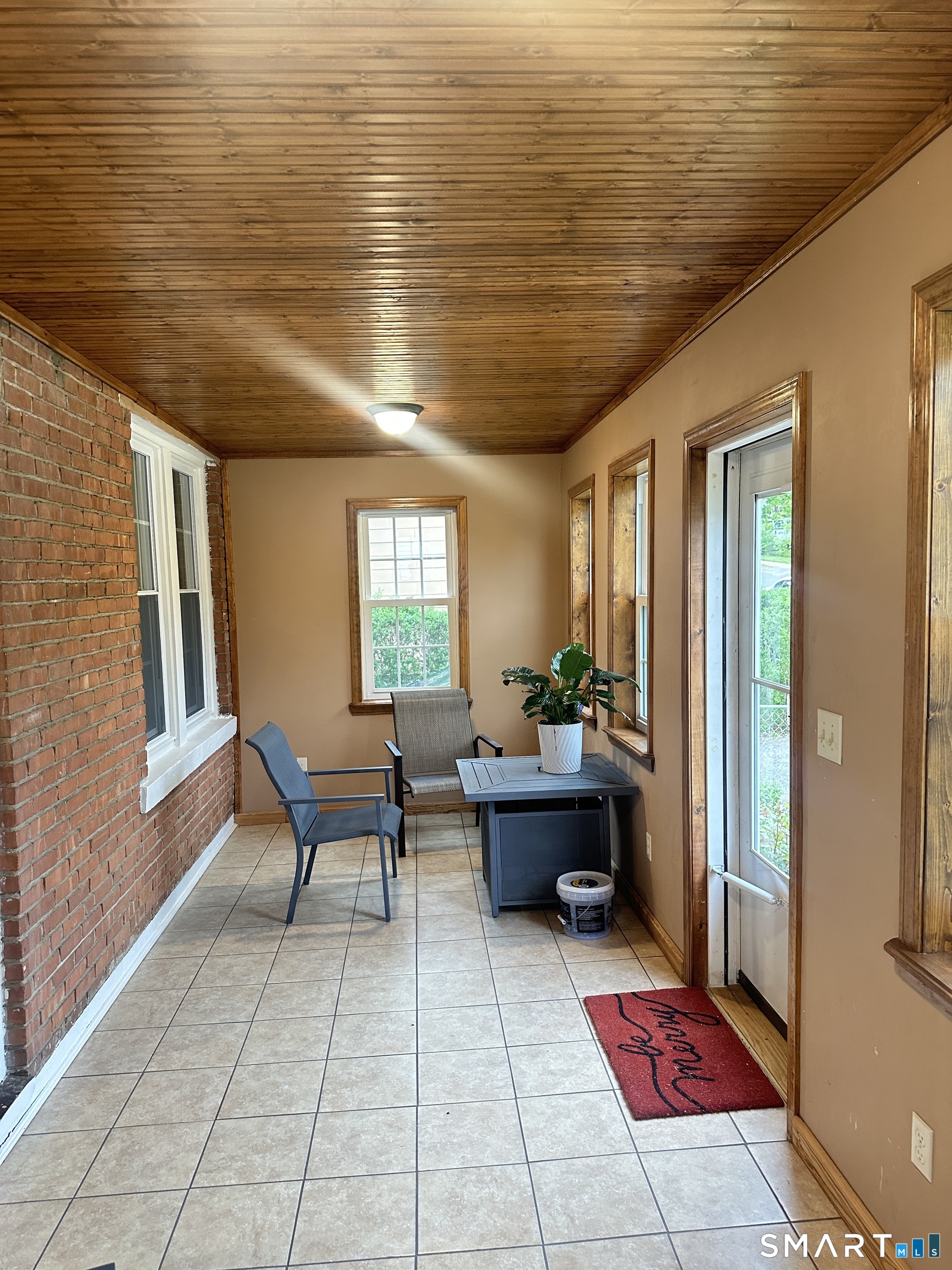 83 Faneuil Street Windsor, CT 06095 - Photo 2 of 14 a outdoor space with lots of windows