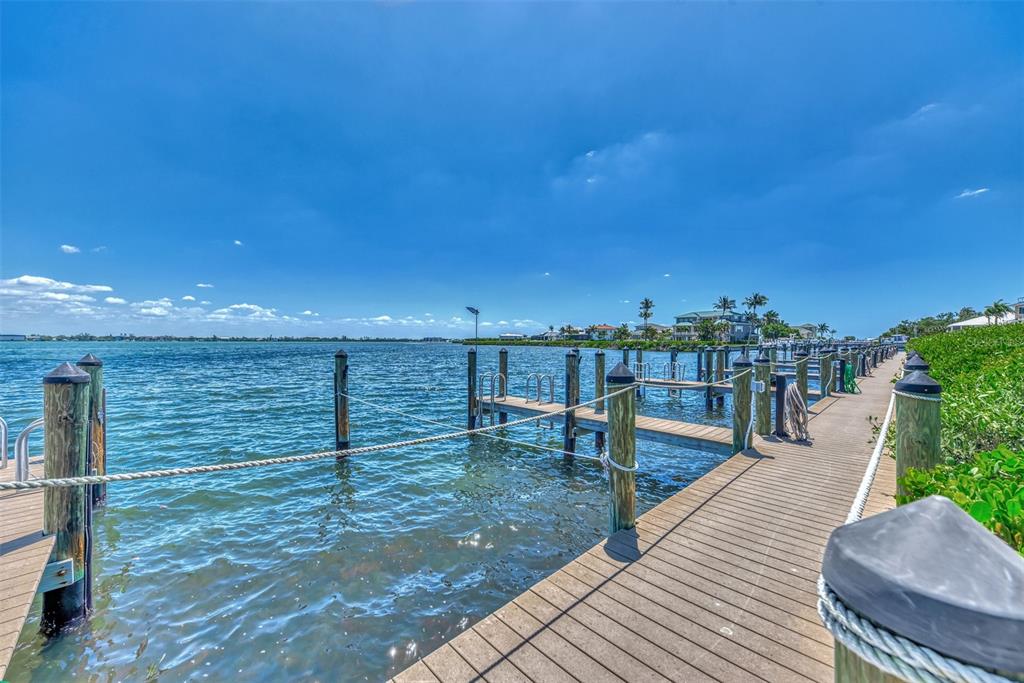 2950 North Beach Road, Unit A315 Englewood, FL 34223 - Photo 48 of 64 a view of a balcony with chairs