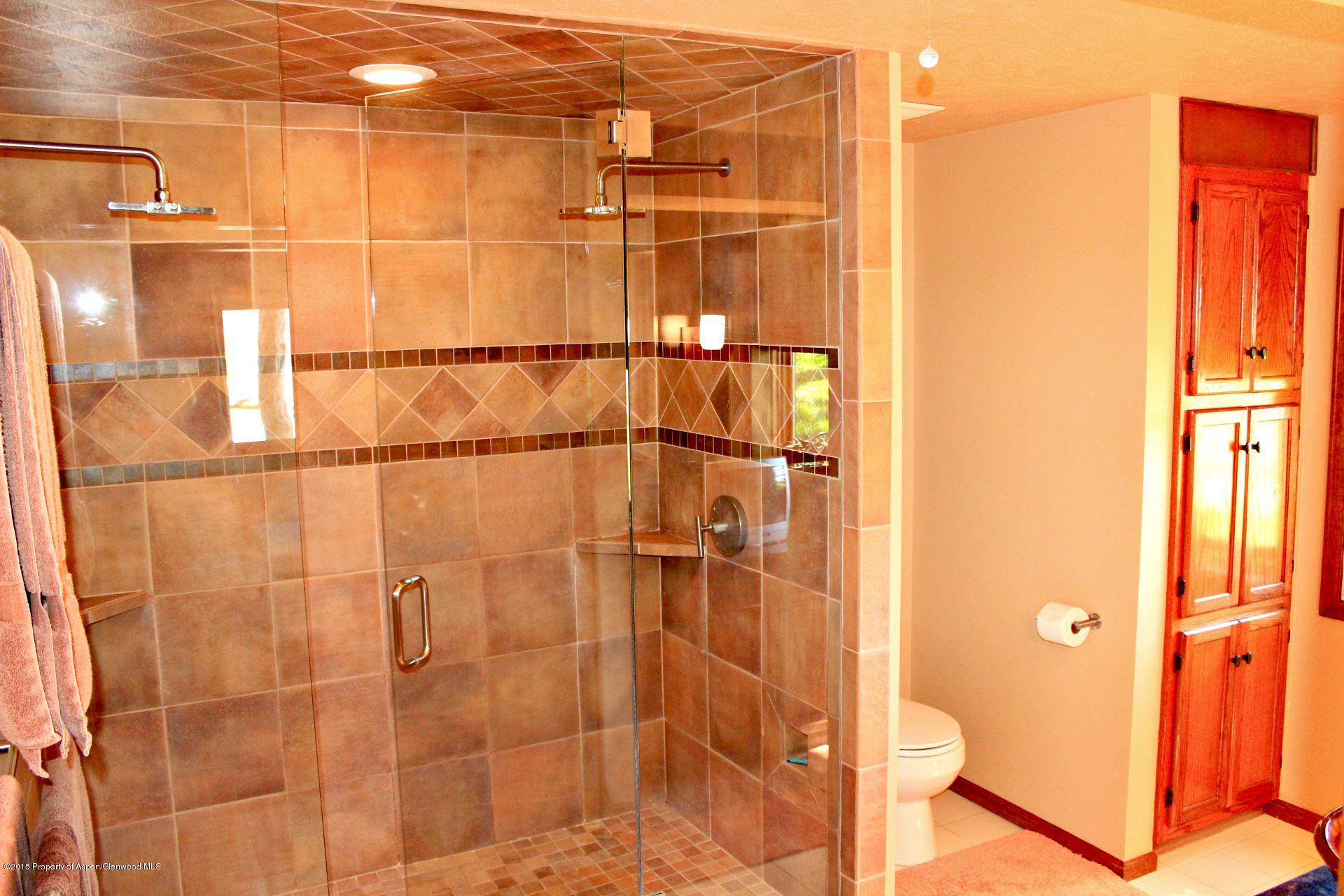 1018 County Road 294 Rifle, CO 81650 - Photo 14 of 31 a bathroom with a shower