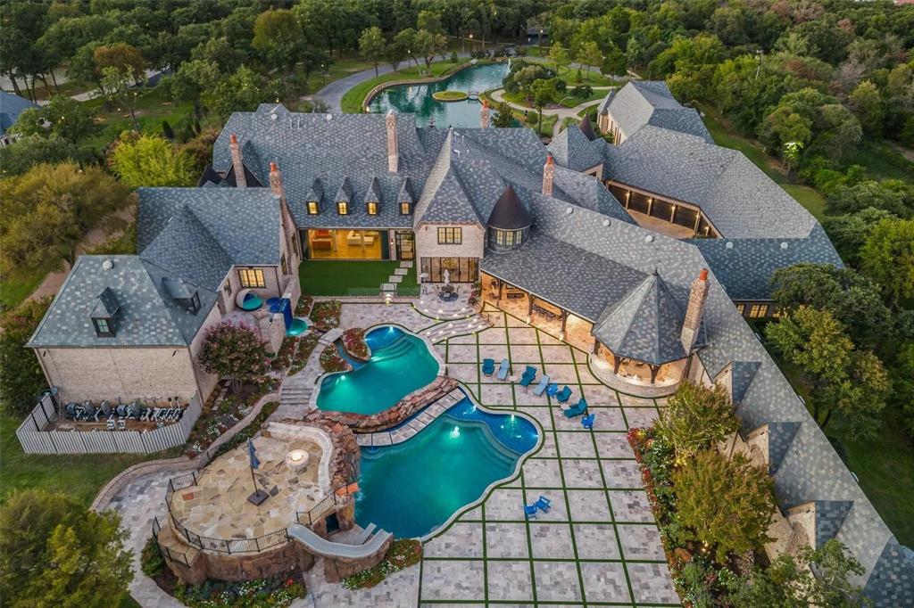 935 West Dove Road Southlake, TX 76092 - Photo 2 of 39 an aerial view of a house with swimming pool and outdoor seating