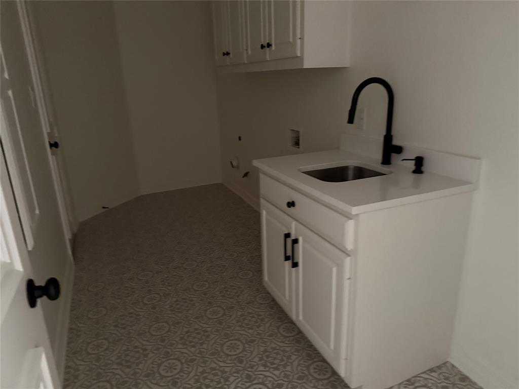 5312 Tennington Park Dallas, TX 75287 - Photo 12 of 19 a close view of sink and tap