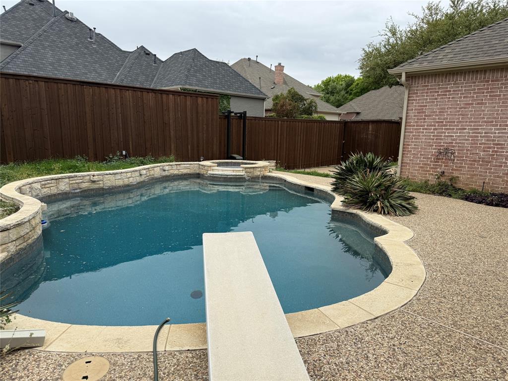 5312 Tennington Park Dallas, TX 75287 - Photo 13 of 19 a view of swimming pool with a yard