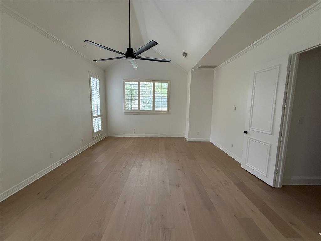 5312 Tennington Park Dallas, TX 75287 - Photo 15 of 19 wooden floor in an empty room with a window