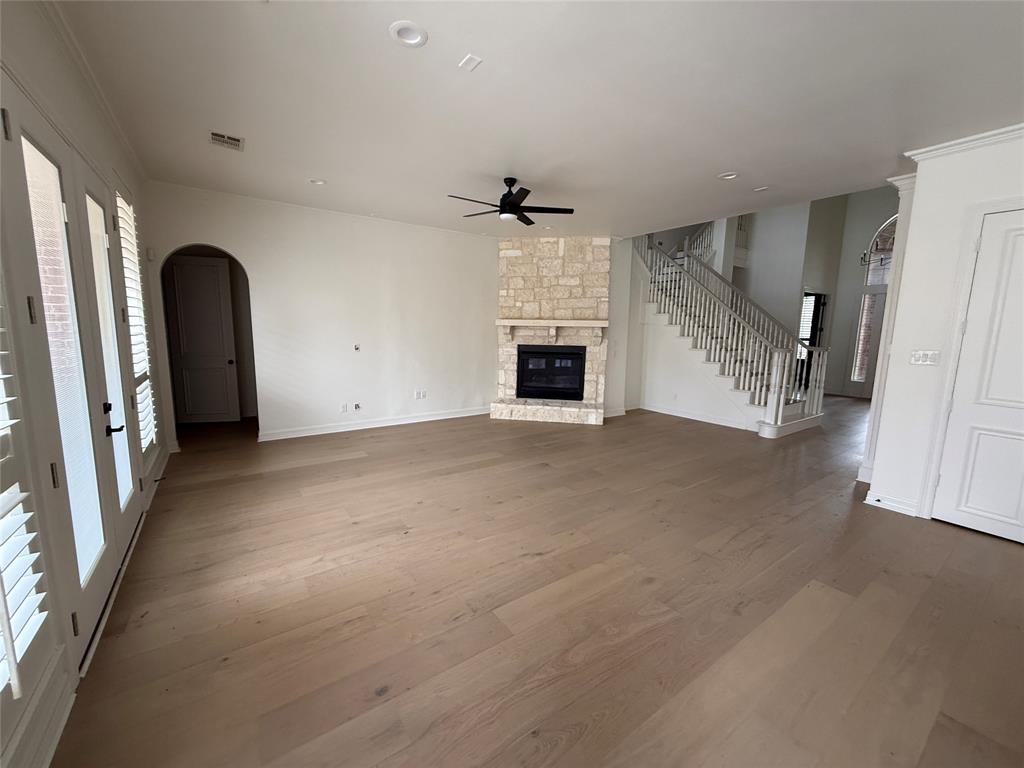 5312 Tennington Park Dallas, TX 75287 - Photo 3 of 19 en view interior of a house with an entryway and fireplace