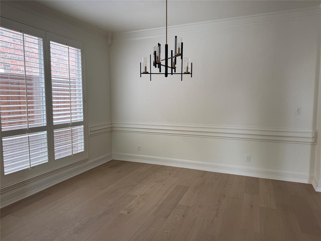 5312 Tennington Park Dallas, TX 75287 - Photo 6 of 19 a view of an empty room with a window
