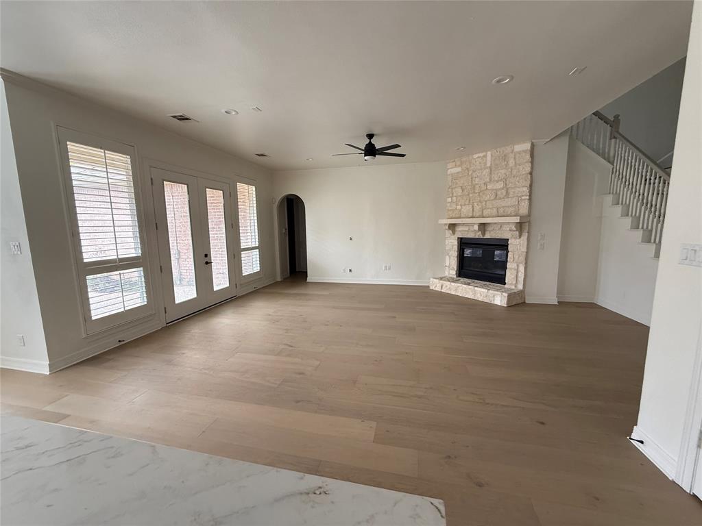 5312 Tennington Park Dallas, TX 75287 - Photo 10 of 19 a view of empty room with a fireplace
