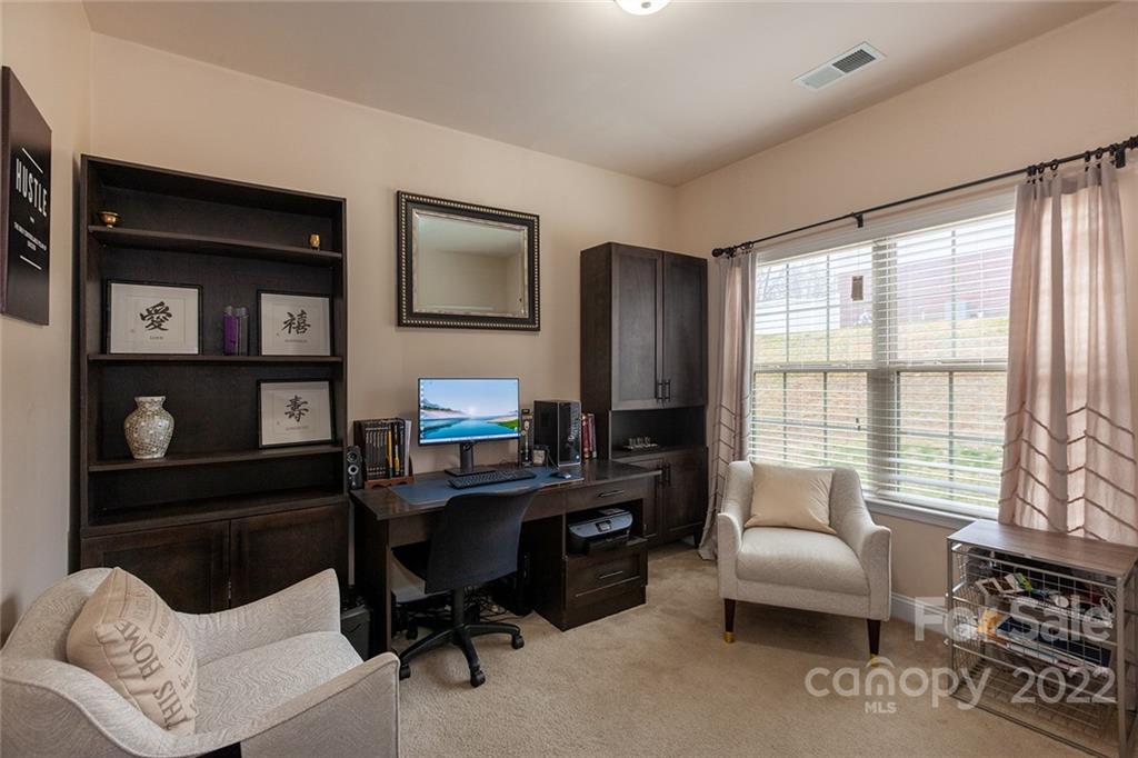 688 Winding Branch Road Rock Hill, SC 29732 - Photo 17 of 38 a view of a livingroom with workspace and a window