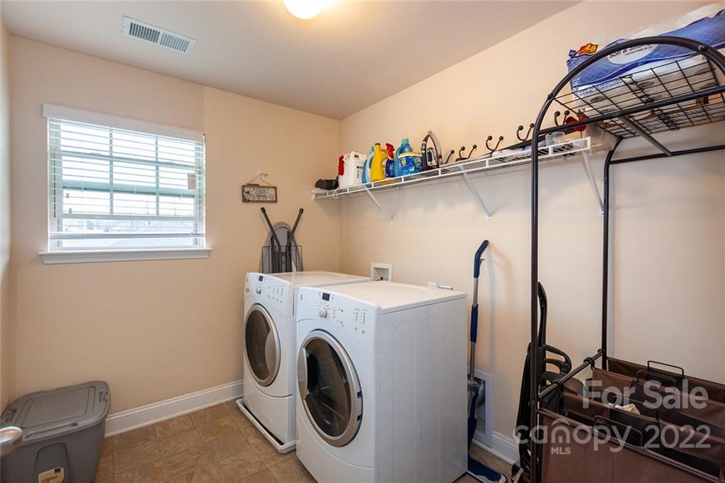 688 Winding Branch Road Rock Hill, SC 29732 - Photo 19 of 38 a utility room with dryer and washer