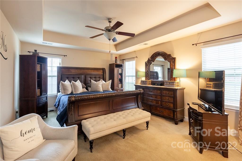 688 Winding Branch Road Rock Hill, SC 29732 - Photo 20 of 38 a living room with furniture and a flat screen tv