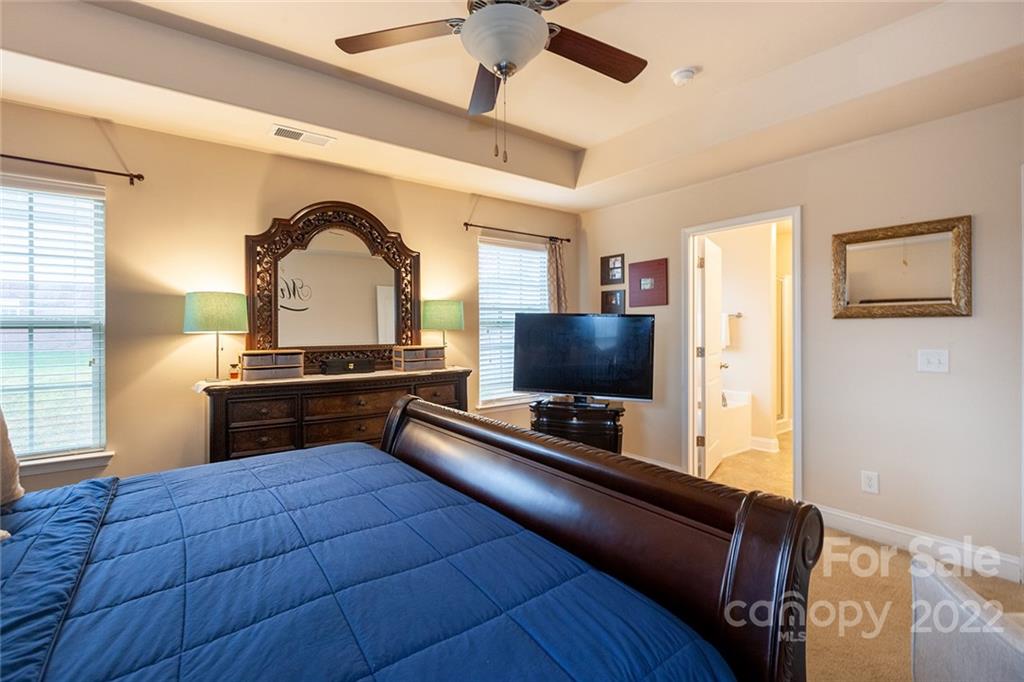 688 Winding Branch Road Rock Hill, SC 29732 - Photo 22 of 38 a living room with furniture and a flat screen tv