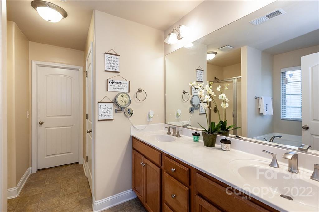 688 Winding Branch Road Rock Hill, SC 29732 - Photo 26 of 38 a bathroom with a double vanity sink mirror and shower