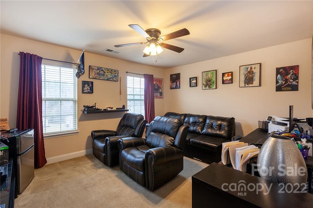 688 Winding Branch Road Rock Hill, SC 29732 - Photo 29 of 38 a living room with furniture and a window